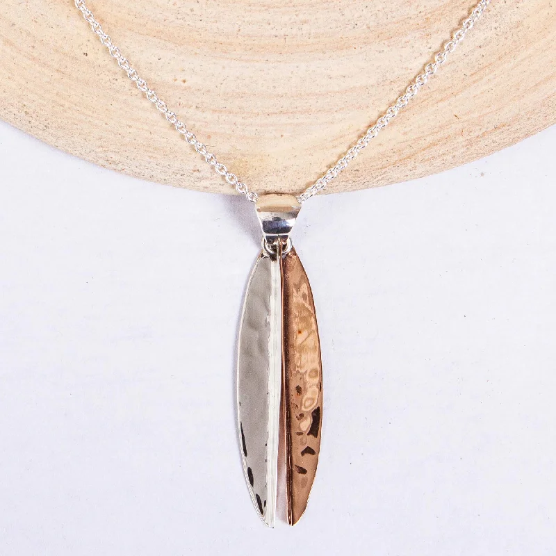 Limited-Stock Jewelry Sale – Shop Before It's Gone Hammered Abstraction Taxco Sterling Silver and Copper Pendant Necklace Limited-Stock Jewelry Sale – Shop Before It's Gone Hammered Abstraction Taxco Sterling Silver and Copper Pendant Necklace