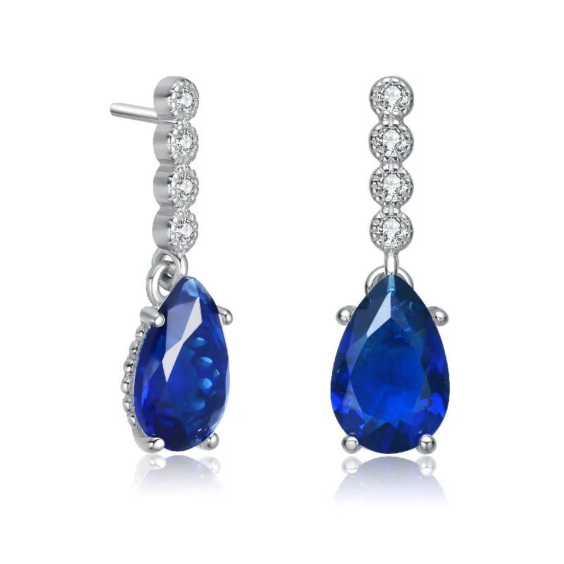 Exclusive Jewelry Bundles At Discounted Prices Sterling Silver Rhodium Plated With Sapphire Blue Baguette And Round Cubic Zirconia Stud Earrings Exclusive Jewelry Bundles At Discounted Prices Sterling Silver Rhodium Plated With Sapphire Blue Baguette And Round Cubic Zirconia Stud Earrings