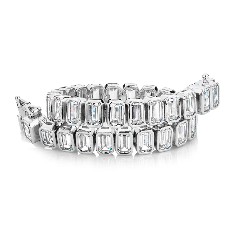 Seasonal Jewelry Deals – Elevate Your Style Emerald Cut tennis bracelet with 29.04 carats* of diamond simulants in sterling silver Seasonal Jewelry Deals – Elevate Your Style Emerald Cut tennis bracelet with 29.04 carats* of diamond simulants in sterling silver