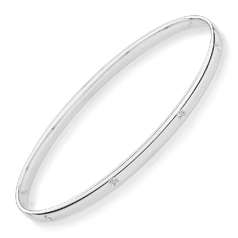 Premium Jewelry Now Available At Special Discounts Oval bangle with diamond simulants in 10 carat white gold