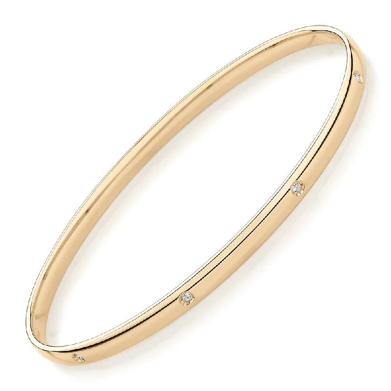 Seasonal Jewelry Deals – Elevate Your Style Oval bangle with diamond simulants in 10 carat yellow gold