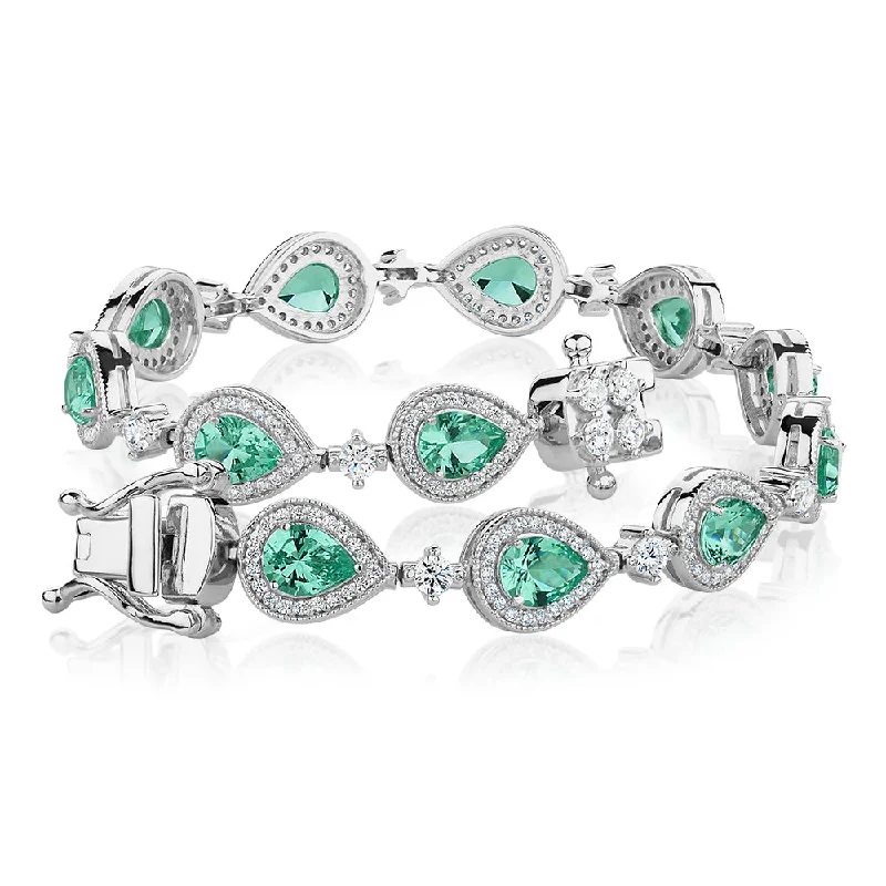 Special Sale On Handcrafted Jewelry – Shop Today Pear and Round Brilliant tennis bracelet with ocean green simulants and 1.50 carats* of diamond simulants in sterling silver Special Sale On Handcrafted Jewelry – Shop Today Pear and Round Brilliant tennis bracelet with ocean green simulants and 1.50 carats* of diamond simulants in sterling silver