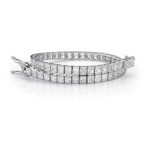 Exclusive Jewelry Offers – Sparkle For Less Princess Cut tennis bracelet with 11.34 carats* of diamond simulants in 10 carat white gold Exclusive Jewelry Offers – Sparkle For Less Princess Cut tennis bracelet with 11.34 carats* of diamond simulants in 10 carat white gold