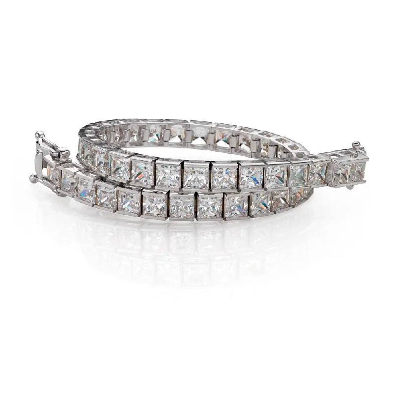 Modern Statement Jewelry For Bold Styling Princess Cut tennis bracelet with 18.72 carats* of diamond simulants in 10 carat white gold Modern Statement Jewelry For Bold Styling Princess Cut tennis bracelet with 18.72 carats* of diamond simulants in 10 carat white gold