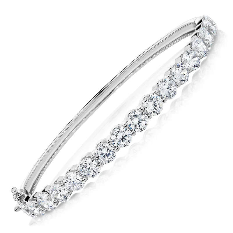 Classic And Modern Jewelry Styles On Sale Round Brilliant bangle with 9.52 carats* of diamond simulants in sterling silver