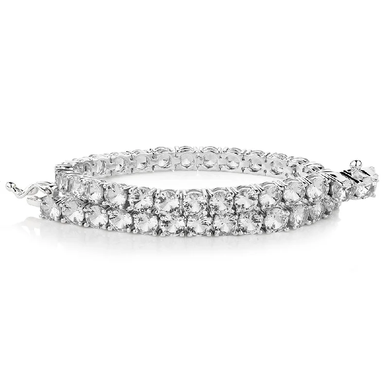 Exclusive Gemstone Jewelry At Special Prices Round Brilliant tennis bracelet with 11 carats* of diamond simulants in sterling silver