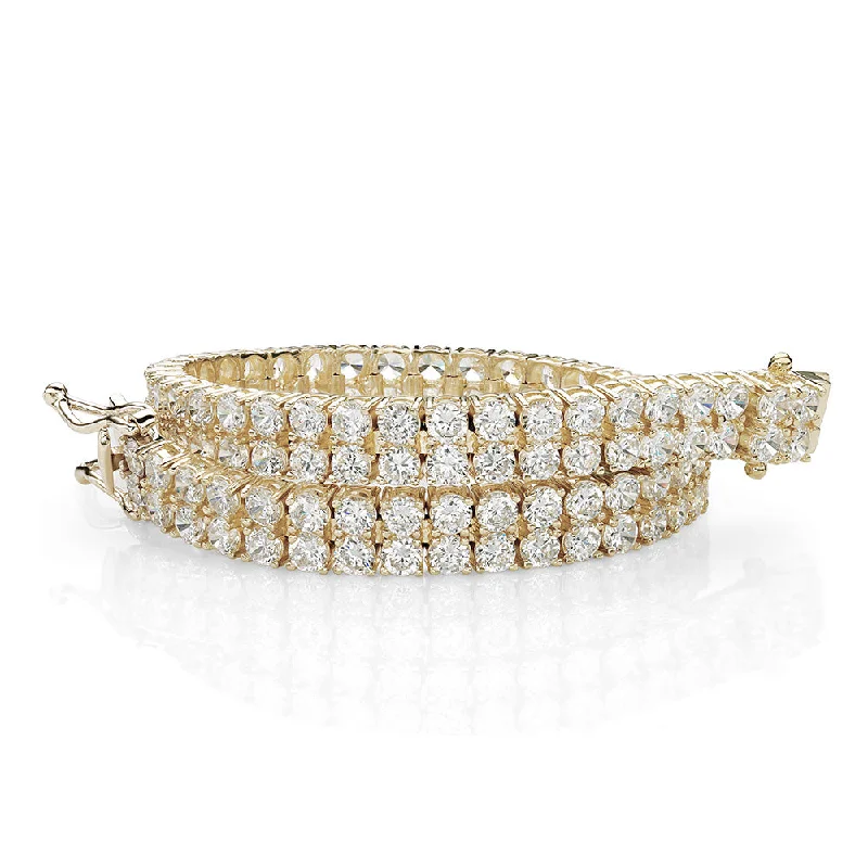 Grab Your Favorite Jewelry At The Lowest Prices Round Brilliant tennis bracelet with 12.54 carats* of diamond simulants in 10 carat yellow gold Grab Your Favorite Jewelry At The Lowest Prices Round Brilliant tennis bracelet with 12.54 carats* of diamond simulants in 10 carat yellow gold