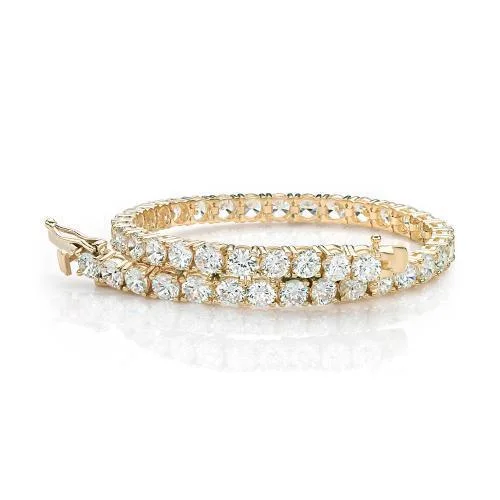 Grab Your Favorite Jewelry At The Lowest Prices Round Brilliant tennis bracelet with 12 carats* of diamond simulants in 10 carat yellow gold Grab Your Favorite Jewelry At The Lowest Prices Round Brilliant tennis bracelet with 12 carats* of diamond simulants in 10 carat yellow gold