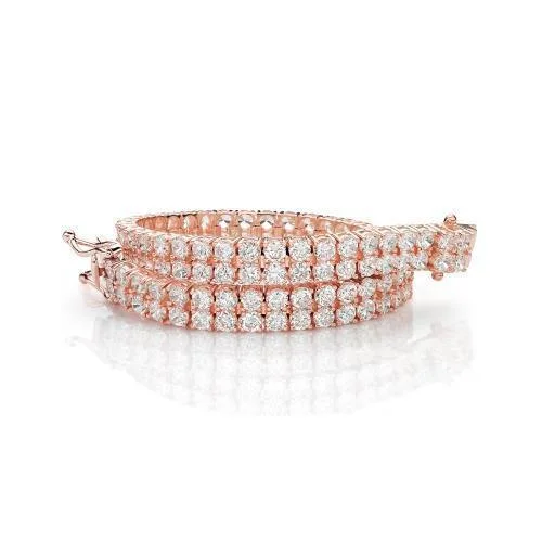 Elegant Rose Gold Jewelry For A Stylish Touch Round Brilliant tennis bracelet with 13.86 carats* of diamond simulants in 10 carat rose gold Elegant Rose Gold Jewelry For A Stylish Touch Round Brilliant tennis bracelet with 13.86 carats* of diamond simulants in 10 carat rose gold