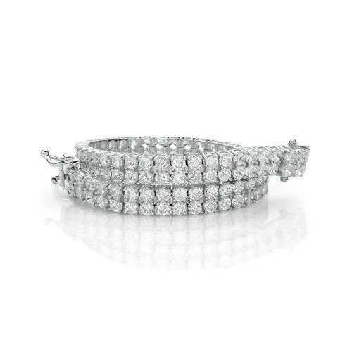 Fashion-Forward Geometric Jewelry For Contemporary Style Round Brilliant tennis bracelet with 13.86 carats* of diamond simulants in 10 carat white gold