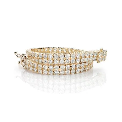 Waterproof Stainless Steel Jewelry For Lasting Beauty Round Brilliant tennis bracelet with 13.86 carats* of diamond simulants in 10 carat yellow gold