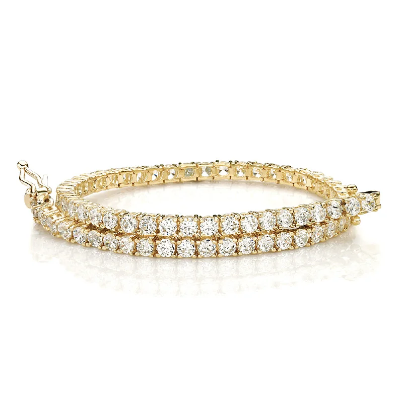 Flash Deals On Fine Jewelry – Shop Before It's Gone Round Brilliant tennis bracelet with 4.02 carats* of diamond simulants in 10 carat yellow gold