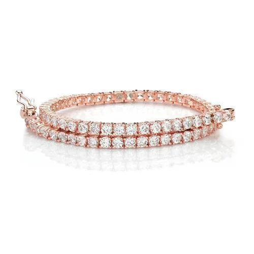 Exclusive Online Discounts On Stylish Jewelry Round Brilliant tennis bracelet with 4.38 carats* of diamond simulants in 10 carat rose gold Exclusive Online Discounts On Stylish Jewelry Round Brilliant tennis bracelet with 4.38 carats* of diamond simulants in 10 carat rose gold
