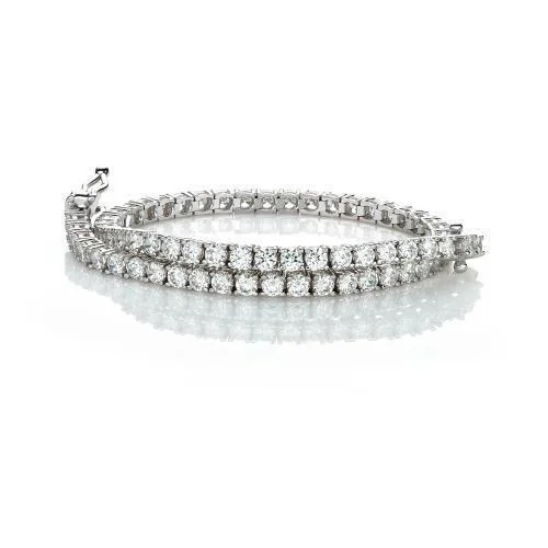 Elegant Jewelry, Affordable Luxury – Shop Now Round Brilliant tennis bracelet with 4.38 carats* of diamond simulants in 10 carat white gold Elegant Jewelry, Affordable Luxury – Shop Now Round Brilliant tennis bracelet with 4.38 carats* of diamond simulants in 10 carat white gold