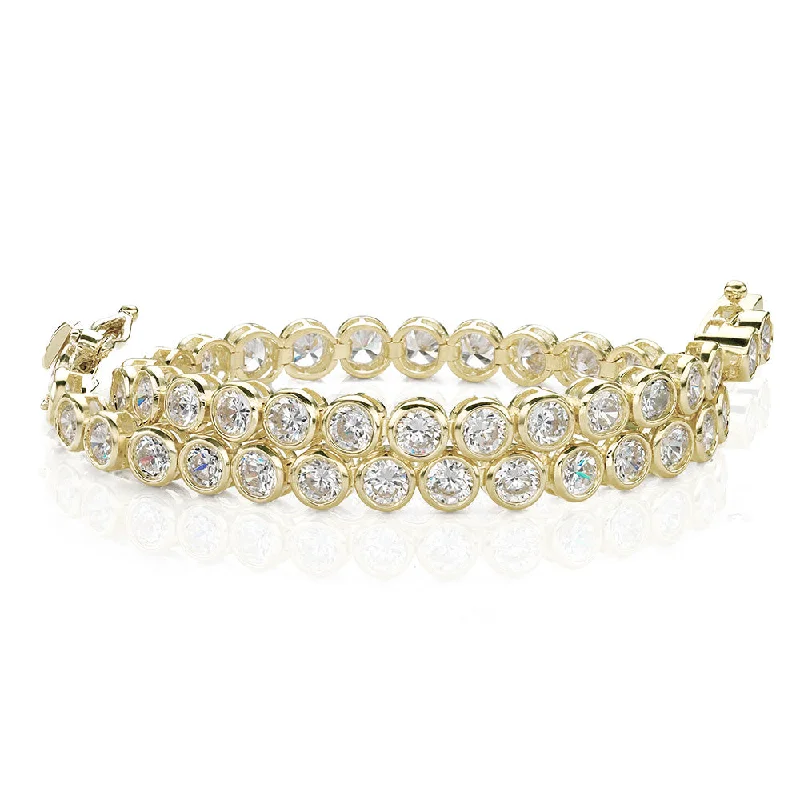 Fashion-Forward Geometric Jewelry For Contemporary Style Round Brilliant tennis bracelet with 5.28 carats* of diamond simulants in 10 carat yellow gold