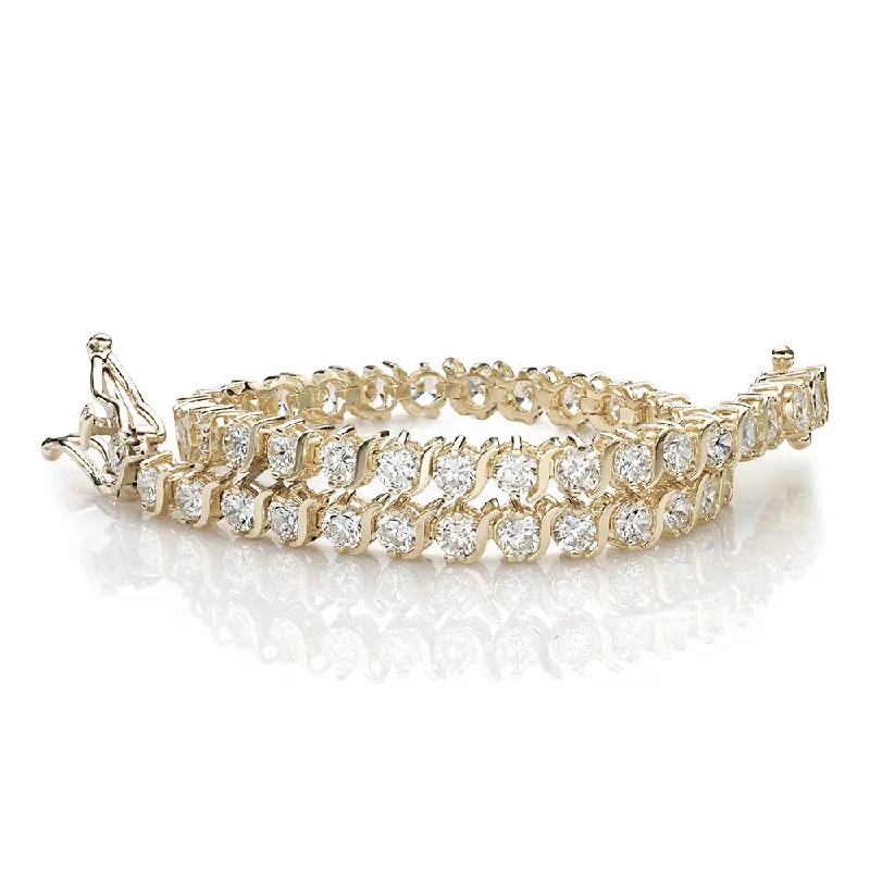 Romantic Heart-Shaped Jewelry For Special Gifts Round Brilliant tennis bracelet with 5.28 carats* of diamond simulants in 10 carat yellow gold Romantic Heart-Shaped Jewelry For Special Gifts Round Brilliant tennis bracelet with 5.28 carats* of diamond simulants in 10 carat yellow gold