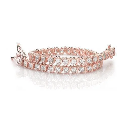 Exclusive Jewelry Sale Event – Shop Now Round Brilliant tennis bracelet with 5.94 carats* of diamond simulants in 10 carat rose gold Exclusive Jewelry Sale Event – Shop Now Round Brilliant tennis bracelet with 5.94 carats* of diamond simulants in 10 carat rose gold