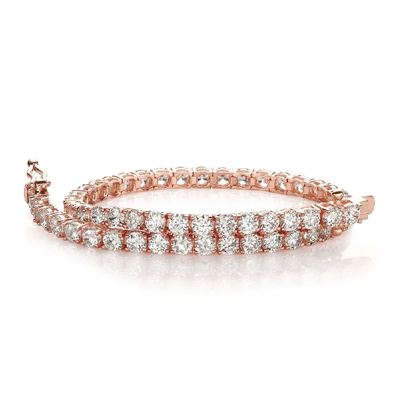 High-End Jewelry, Now More Affordable Than Ever Round Brilliant tennis bracelet with 6.27 carats* of diamond simulants in 10 carat rose gold High-End Jewelry, Now More Affordable Than Ever Round Brilliant tennis bracelet with 6.27 carats* of diamond simulants in 10 carat rose gold