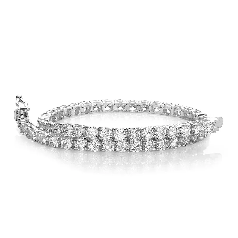 The Perfect Jewelry Piece At The Perfect Discount Round Brilliant tennis bracelet with 6.27 carats* of diamond simulants in 10 carat white gold