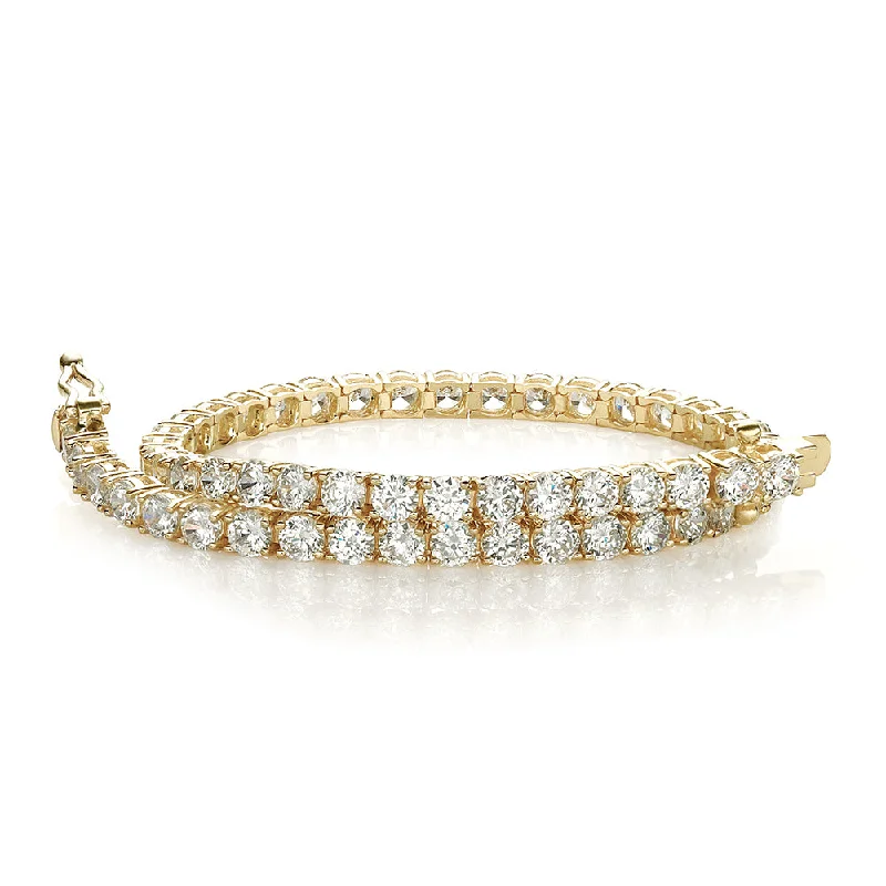 Elevate Your Jewelry Collection With Limited-Time Savings Round Brilliant tennis bracelet with 6.27 carats* of diamond simulants in 10 carat yellow gold