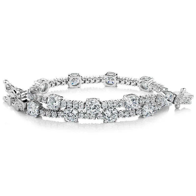 Get The Sparkle You Love At Prices You Adore Round Brilliant tennis bracelet with 8.15 carats* of diamond simulants in sterling silver Get The Sparkle You Love At Prices You Adore Round Brilliant tennis bracelet with 8.15 carats* of diamond simulants in sterling silver