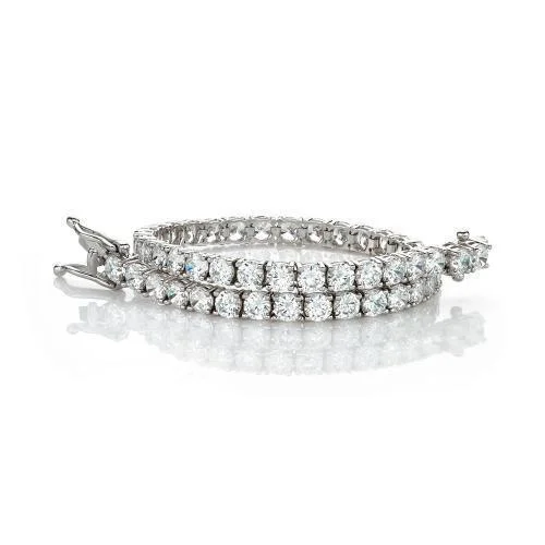 Luxury Jewelry Now At Special Promotional Rates Round Brilliant tennis bracelet with 9.52 carats* of diamond simulants in 10 carat white gold Luxury Jewelry Now At Special Promotional Rates Round Brilliant tennis bracelet with 9.52 carats* of diamond simulants in 10 carat white gold