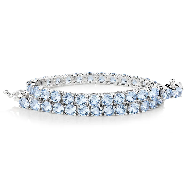 Luxury Jewelry At Unbeatable Discounts Round Brilliant tennis bracelet with aquamarine simulants in sterling silver Luxury Jewelry At Unbeatable Discounts Round Brilliant tennis bracelet with aquamarine simulants in sterling silver
