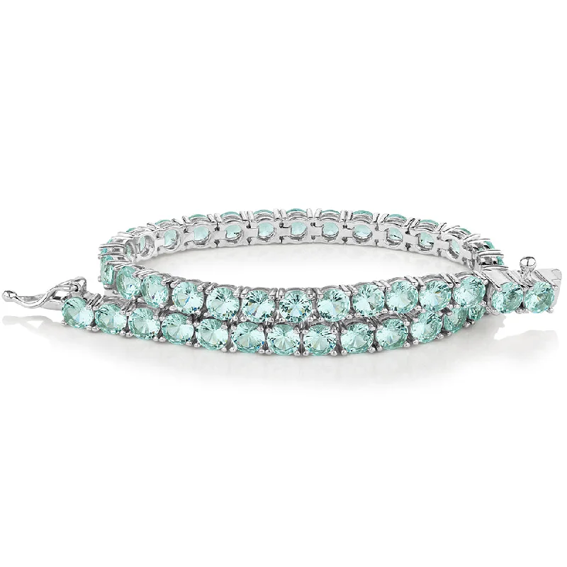 Timeless Jewelry Styles At Wallet-Friendly Prices Round Brilliant tennis bracelet with ocean green simulants in sterling silver