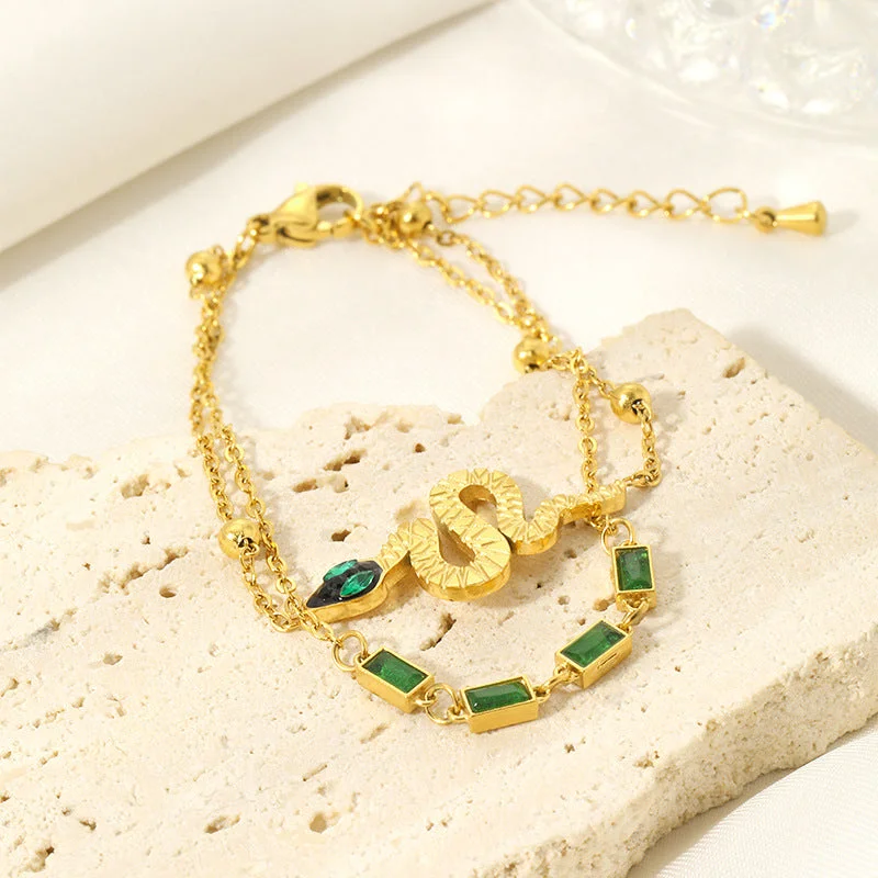 Glamorous Jewelry, Glamorous Deals – Shop Now Snake Design with Green Gemstones Gold Bracelet JLTB0547