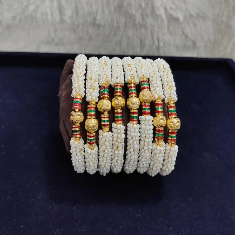 Dazzle In Elegance With Our Biggest Jewelry Sale Pooja Bangles Gold Plated Pearls Bangles Set Dazzle In Elegance With Our Biggest Jewelry Sale Pooja Bangles Gold Plated Pearls Bangles Set