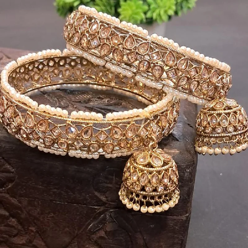 Trending Jewelry Styles Now At Limited-Time Discounts Raddhi Jewels Premium Gold-Plated Kundan Pearl Set of 2 Brass Bangles with Hanging Jhumki Trending Jewelry Styles Now At Limited-Time Discounts Raddhi Jewels Premium Gold-Plated Kundan Pearl Set of 2 Brass Bangles with Hanging Jhumki