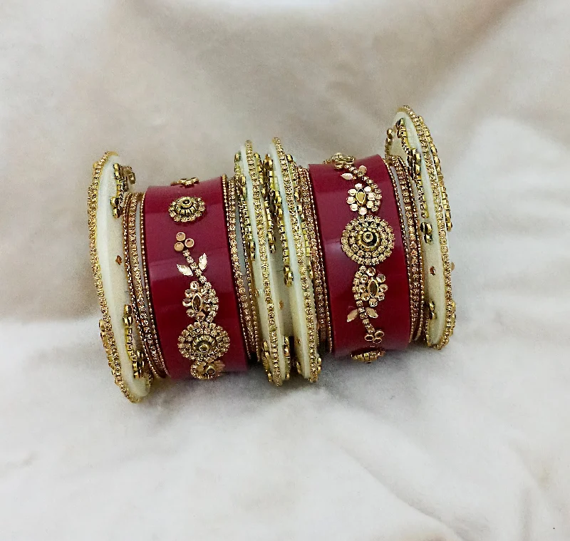 Stunning Jewelry At A Fraction Of The Price Sejal Gold Plated Maroon Austrian Stone Bangle Set - 1403748 Stunning Jewelry At A Fraction Of The Price Sejal Gold Plated Maroon Austrian Stone Bangle Set - 1403748
